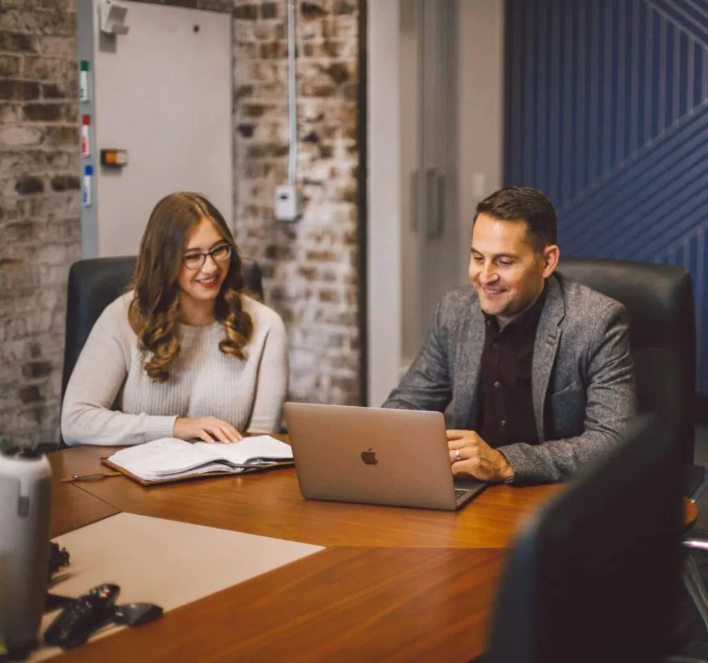 Kevin and Charista working together at Fairway Business Brokers office